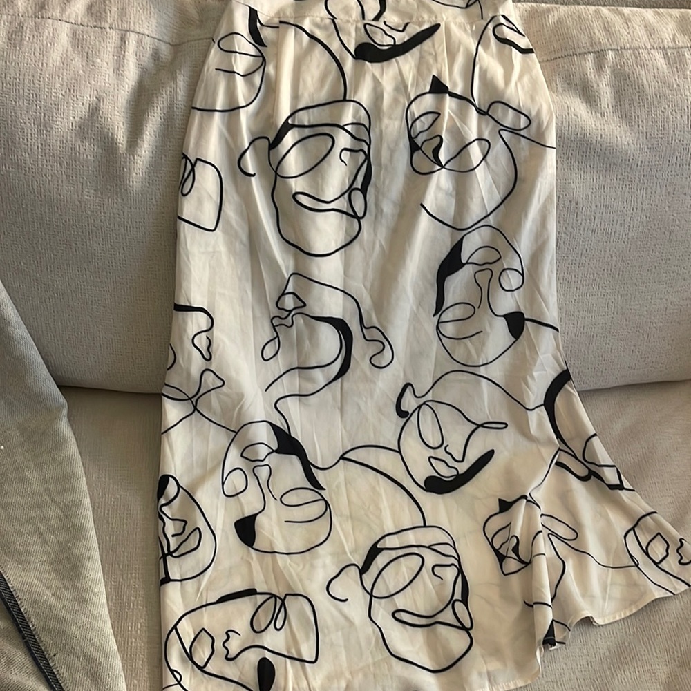 Abstract face long skirt